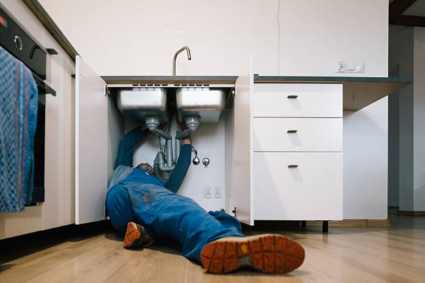 Professional Plumbing technician working in Garrison, MD